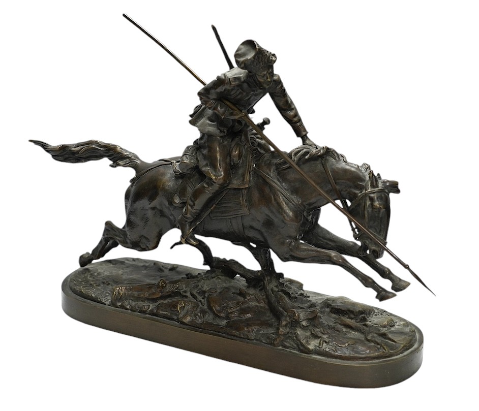 After Eugene Lanceray (Russian, 1848-1886), bronze study of a Cossack charging, signed in cyrillic, 39cm wide. Condition - good